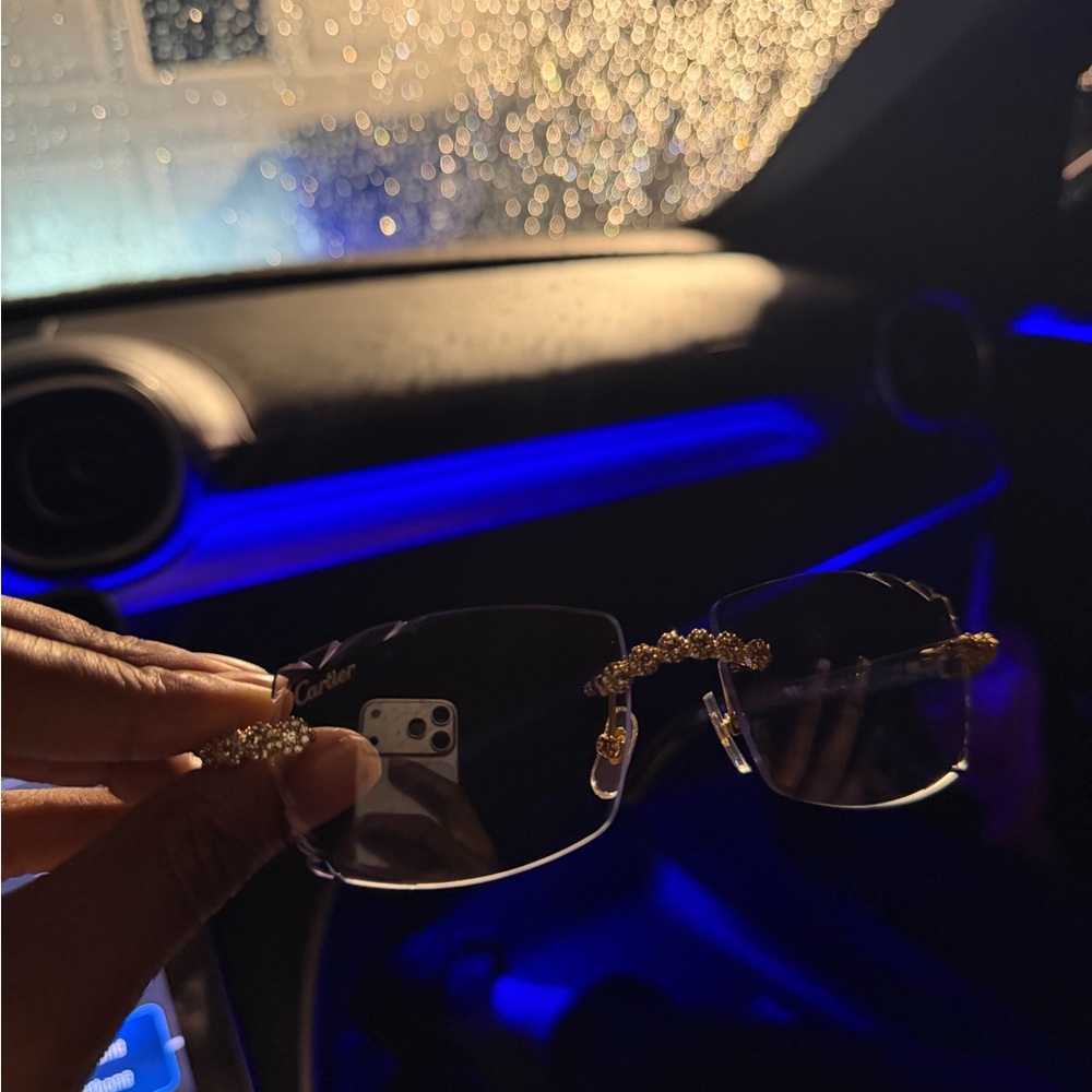 Cartier Black Lensed Sunglasses with Gold Embellished Bridge